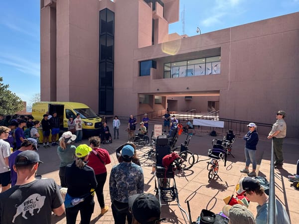 Community members gather at NCAR before beginning adaptive hikes.